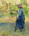 paysanne couchant 1882 Camille Pissarro